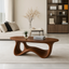 Sculptural Wave Wooden Coffee Table – Modern Curved Design